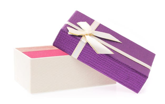 Purple gift box with white ribbon isolated on white background.