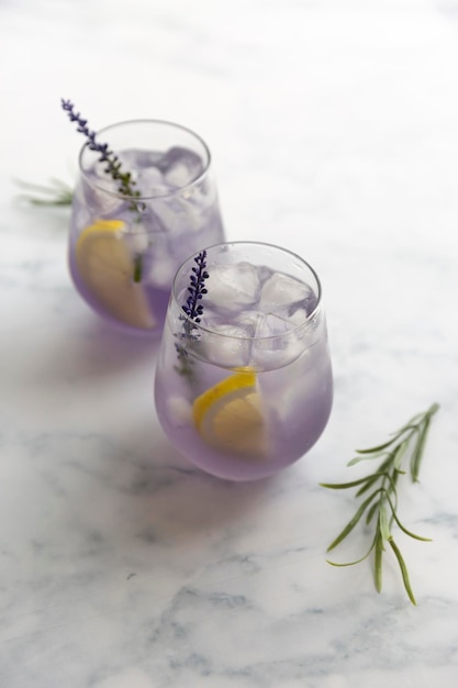 Purple lavender refreshing ice tea with lemon