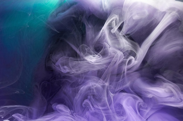 Purple lilac multicolored smoke abstract background acrylic paint underwater explosion