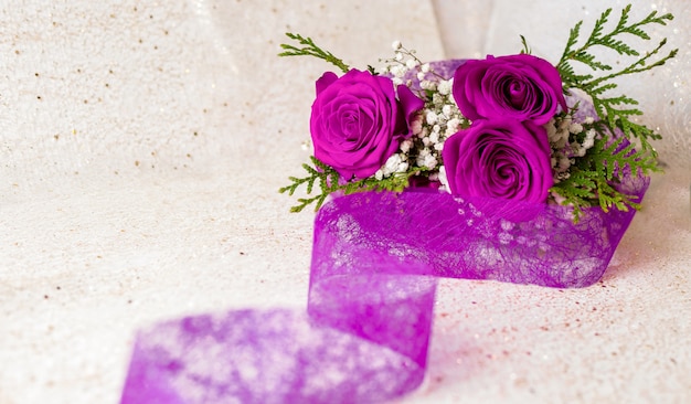 Purple love roses and purple band with golden background