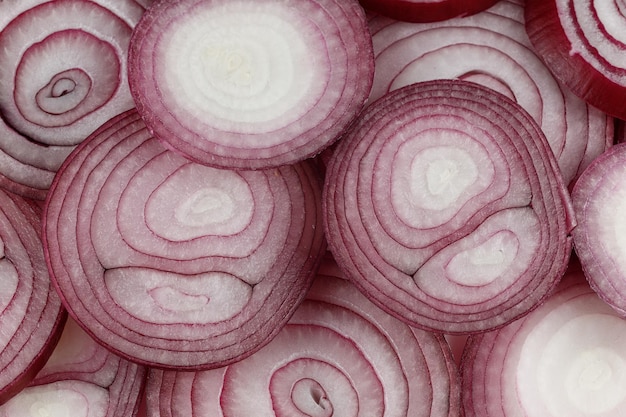 Purple onion cut into rings food background Purple onion background or texture