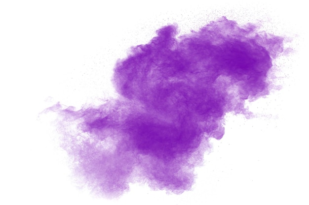 Purple particles explosion on white backgroundFreeze motion of purple dust splash on background