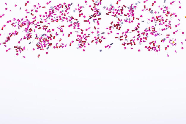 Purple and pink shiny particles on a light background Place to copy The perfect holiday backdrop for your presentation