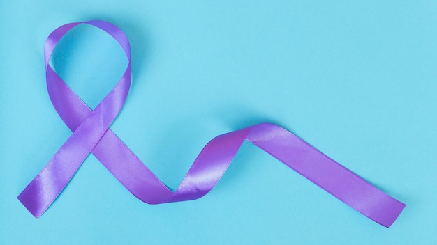 Purple ribbon on blue background ADDADHDAlzheimer Disease Arnold Chiari MalformationChildhood Hemiplegia stroke Epilepsy Chronic Acute PainCrohns