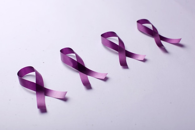 Purple ribbons in a row for Cancer Awareness