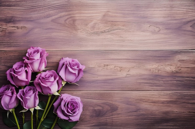 Purple rose composition on wooden tabletop