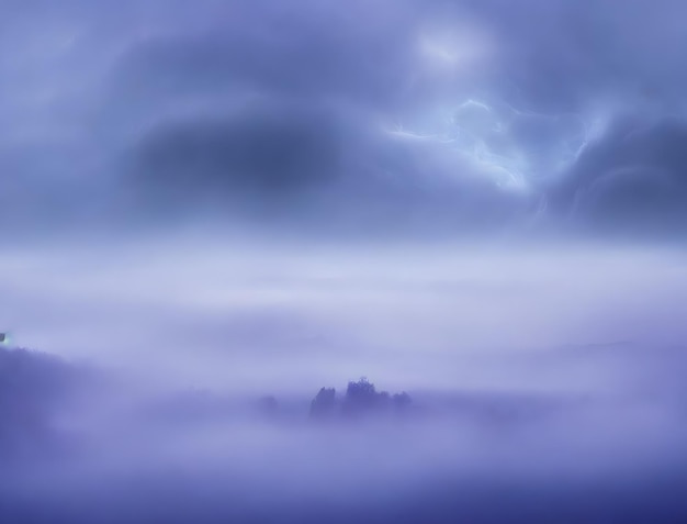 A purple sky with clouds and a tree in the middle.