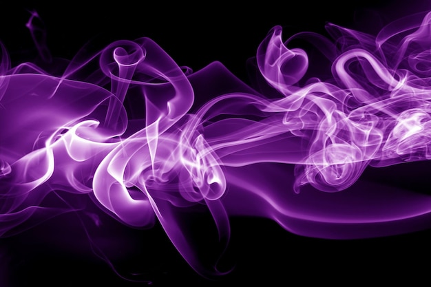 Purple smoke abstract on black background for design ink water color