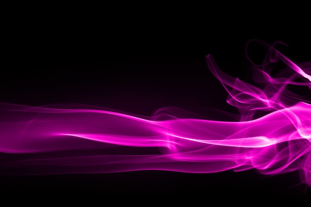 Purple smoke abstract on black and darkness concept