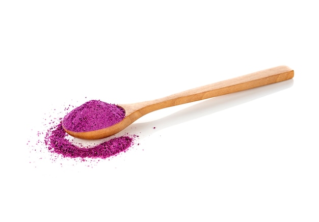 Purple sweet potatoes powder on white