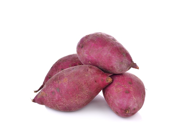 Purple sweet yams on white background