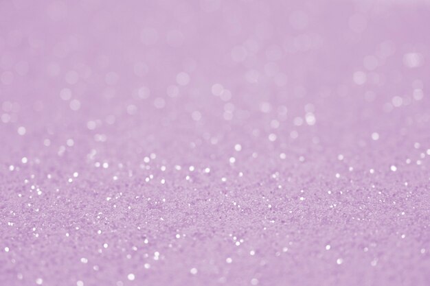 Purple vintage glitter defocused blurred texture christmas abstract background.