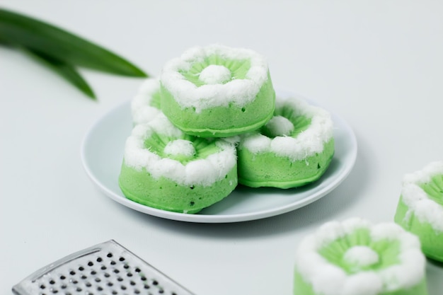 Putu Ayu traditional Indonesian cake The cake is green with the aroma of pandan and grated coconut topping