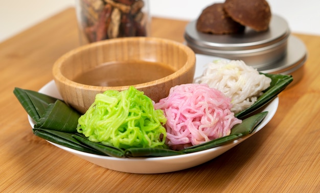 Putu Mayang snack from javanese made from rice flour eaten with coconut milk and palm sugar