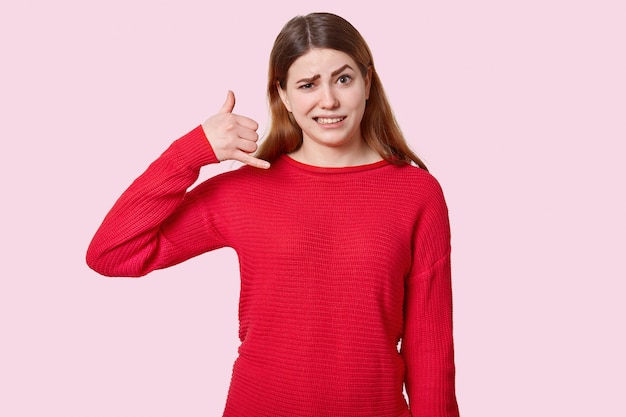 Puzzled woman with dark eyebrows