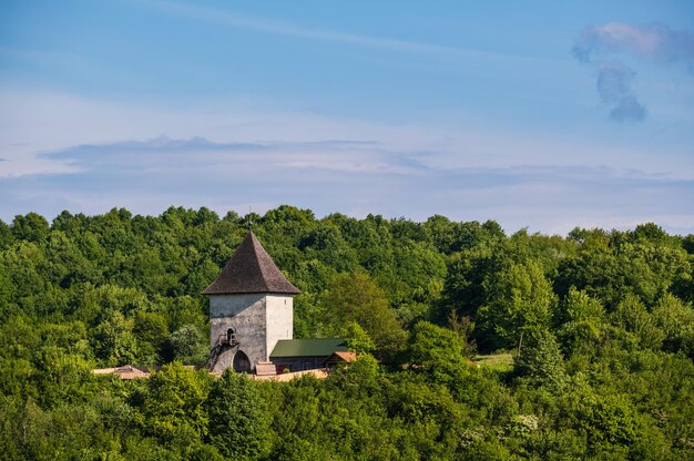 Pyatnychany tower defense structure 15th century on forest hill slope Lviv Region Ukraine