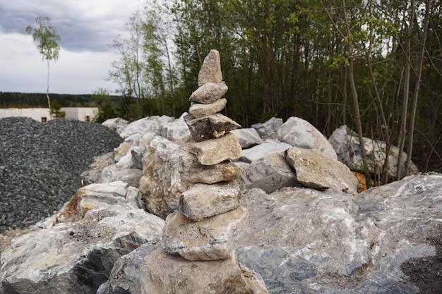 Pyramid made of stones in a former marble quarry