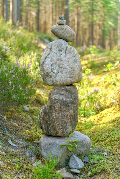 Pyramid of stones Unstable balance of stone objects Idyllic state of nature