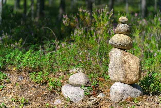 Pyramid of stones Unstable balance of stone objects Idyllic state of nature