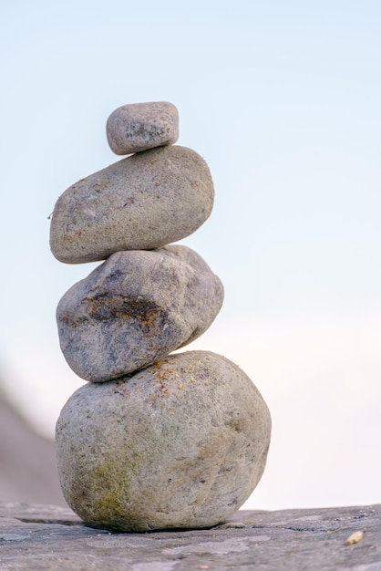 Pyramid of stones Unstable balance of stone objects Idyllic state of nature