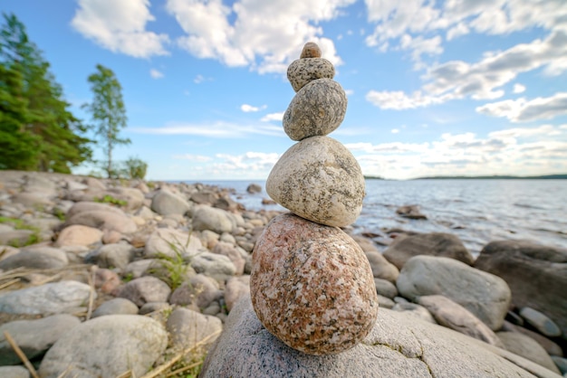 Pyramid of stones Unstable balance of stone objects Idyllic state of nature