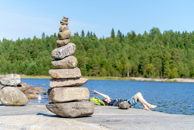 Pyramid of stones Unstable balance of stone objects Idyllic state of nature