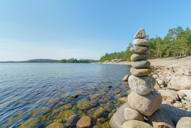 Pyramid of stones Unstable balance of stone objects Idyllic state of nature