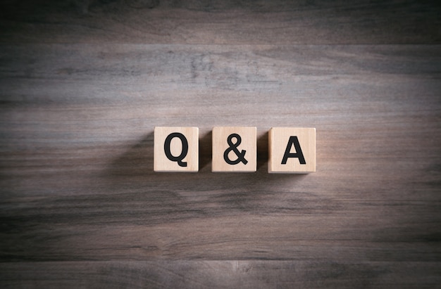 Q and A word with wooden cube. FAQ-frequently asked questions