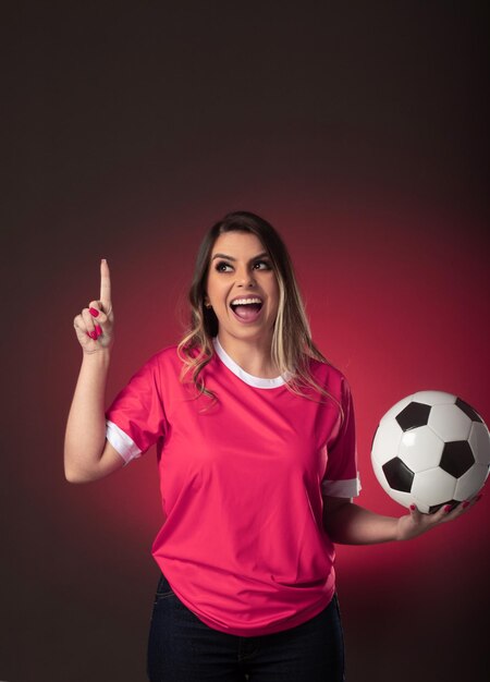 Qatar woman soccer fan cheering for her favorite club and team world cup purple background