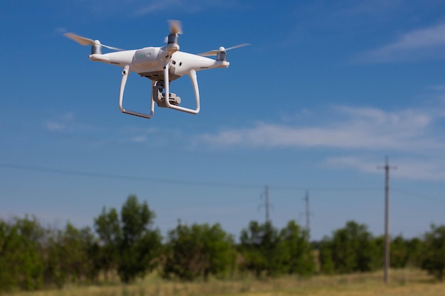 Quadrocopter flying over the landscape