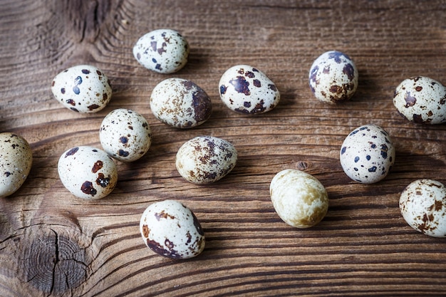 Quail eggs on a wooden board