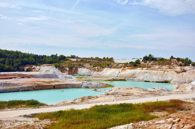 Quarry extraction porcelain clay kaolin with turquoise water