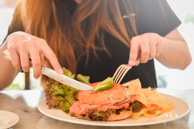 Quick lunch. Smoked salmon bagel with salad and chips