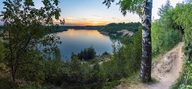 A quiet evening sunset on the shore of the Pugarevsky quarry