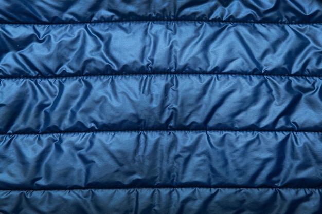 Quilted blue fabric as a background