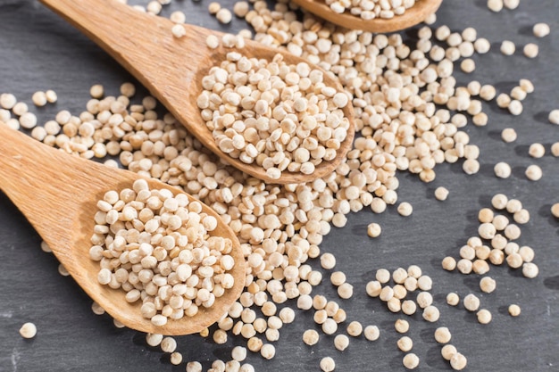 Quinoa beans in bowl on rustic wood