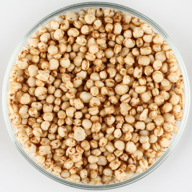 Quinoa granules in a glass bowl