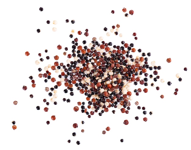 Quinoa seeds isolated on white background mix of white red and black quinoa top view