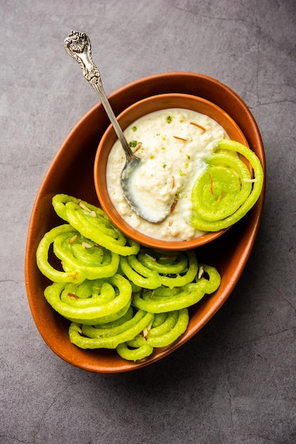 Rabdi Jalebi Green jilebi or imarati with Rabri made from condensing milk Indian dessert