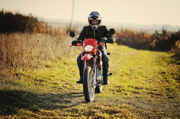  racer sitting on his motorcycle