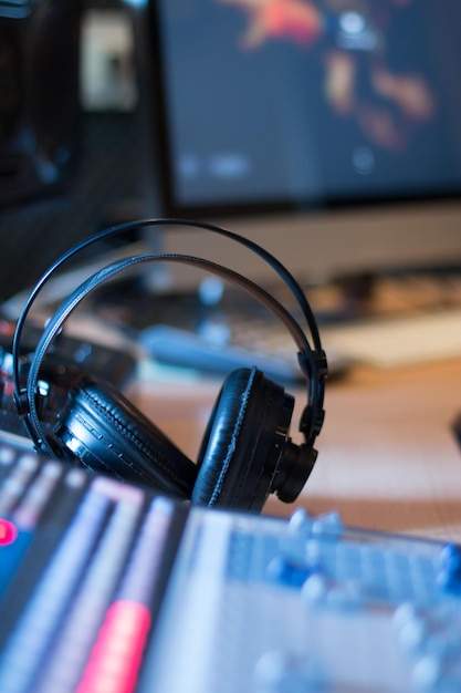 Radio station Headphones on a mixer desk in an professional sound recording studio