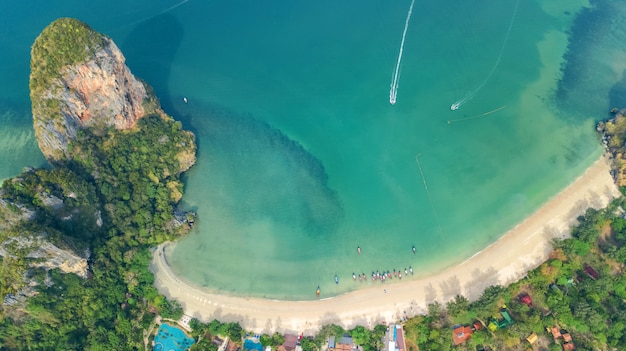 Railay beach in Thailand, Krabi province, aerial bird's view of tropical Railay and Pranang beaches with rocks and palm trees, coastline of Andaman sea from above