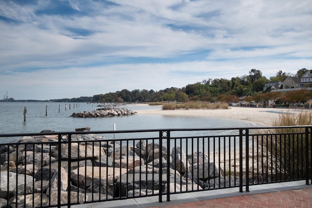 Railing along the York River in Yorktown, VA with the view of Yorktown Beach