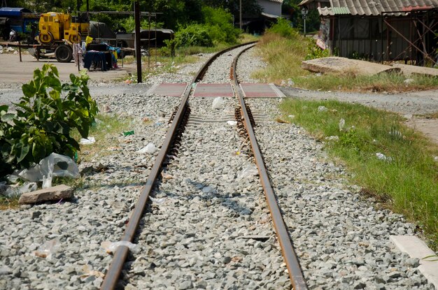 Railroad tracks and railway track tie sleeper for train running in Tha Chalom station at Mahachai city on January 31 2017 in Samut Sakhon Thailand