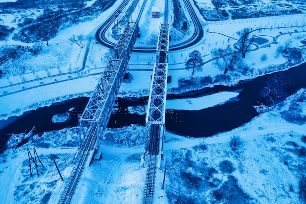 Railway bridge winter Winter industrial landscape View from above