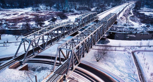 Railway bridge winter Winter industrial landscape View from above