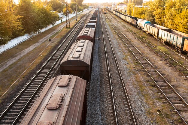 Railway. Freight wagons carrying different loads. Heavy industry concept