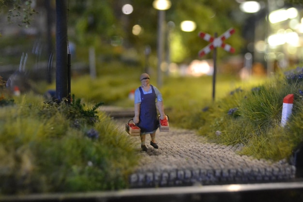 Railway station with train station, wagons and people in miniature. Wieliczka, Poland