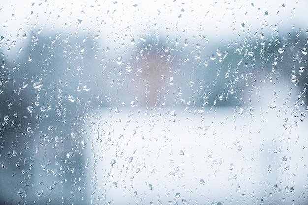 Rain water drops on window glass Raindrop on the glass Abstract raindrop background Water drops close up view