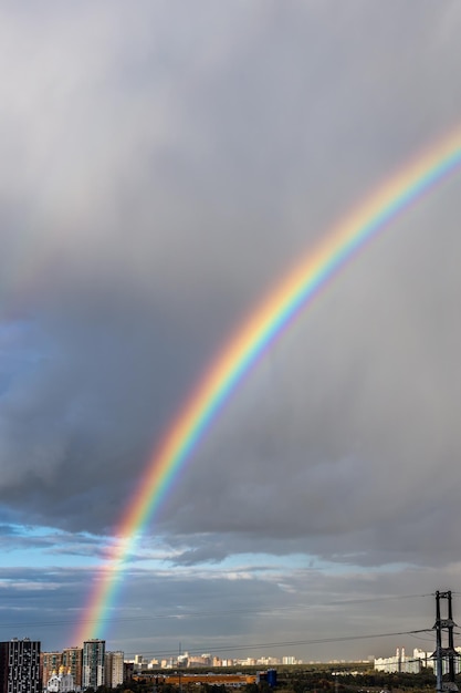 Rainbow after a downpour over a big city